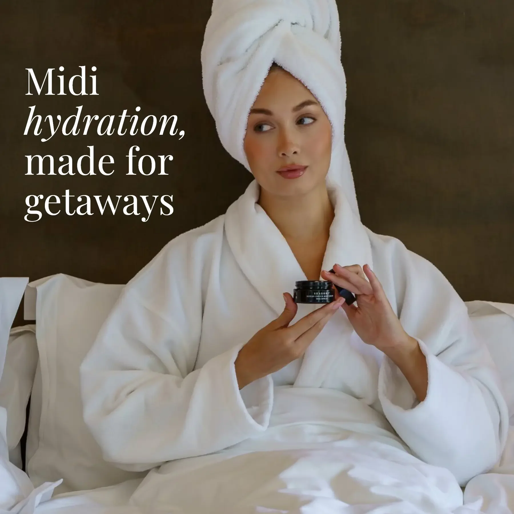 Seabody Glycan Enrich Moisturiser MIDI Size Womwn on bed using Seabody Glycan Enrich Moisturiser MIDI Size, ideal for getaways