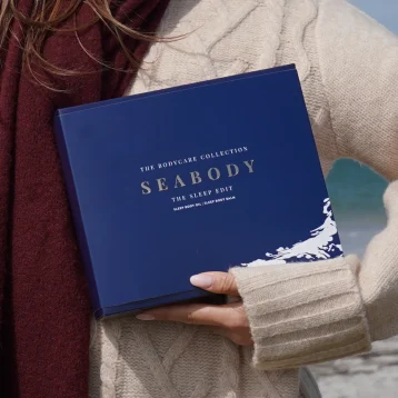 Woman holding Sleep Edit giftset