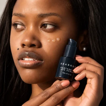 Girl holding Seabody Pentabrite Eye Serum